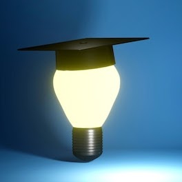 lightbulb wearing a graduation cap